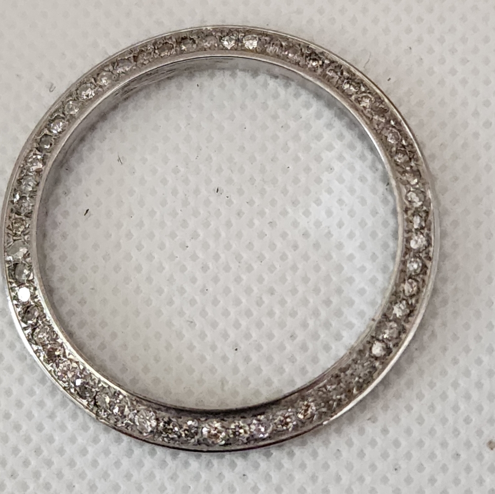 Rolex after diamonds bezel